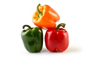 A green, yellow and red bell pepper.