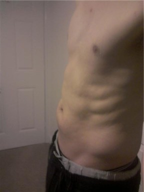 A left side shot of my abs after completing the Slendertone 6 Week Plan.