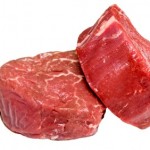 Two beef fillet steaks on a white background.