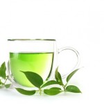 A glass cup of green tea.