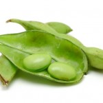 A close up shot on a pod of soy beans.