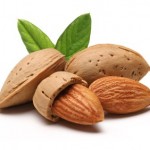 4 almonds on a white background.