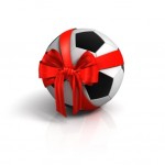A football wrapped in a ribbon.