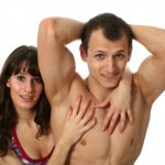 A muscular couple posing.