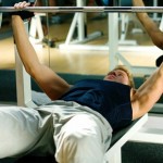 A man performing the bench press.