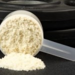 A scoop of whey protein powder.