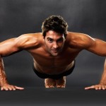 A man performing a press up.