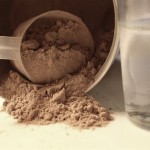 A close up shot of chocolate whey protein.